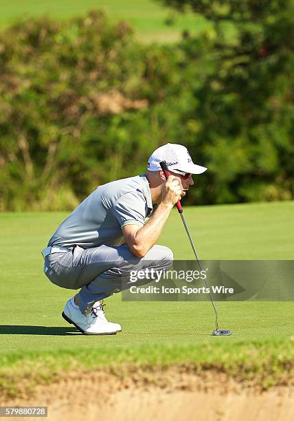 Ben Crane lines up his putt on the third green of the First Round of the Hyundai Tournament of Champions at Kapalua Plantation Course on Maui, HI.