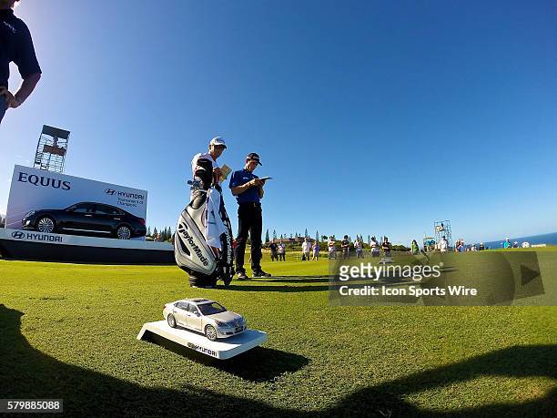 Camilo Villegas and his caddie figure out the yardage on number eleven during the Second Round of the Hyundai Tournament of Champions at Kapalua...