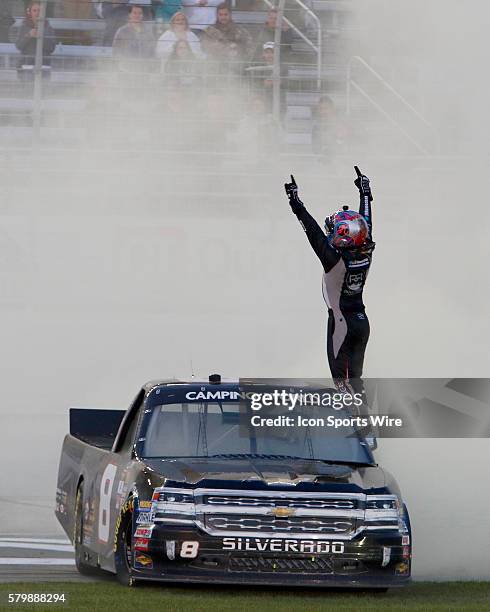 John Hunter Nemechek celebrates winning the Great Clips 200 NASCAR Camping World Truck Series race at the Atlanta Motor Speedway in Hampton, GA.