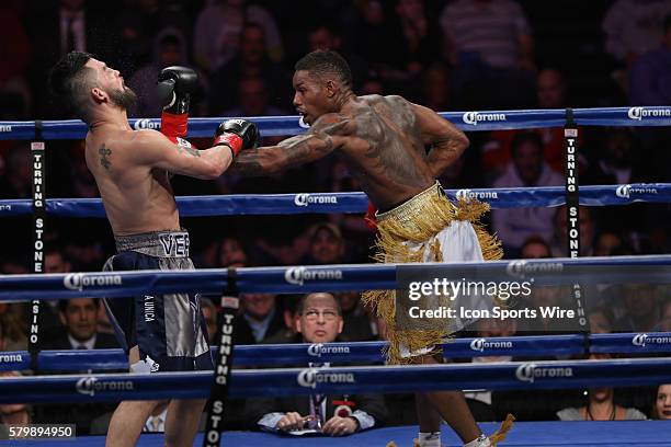 Willie Monroe Jr. Punches Bryan Vera during their NABA/NABO middleweight championship fight at the Turning Stone Resort Casino in Verona, NY.