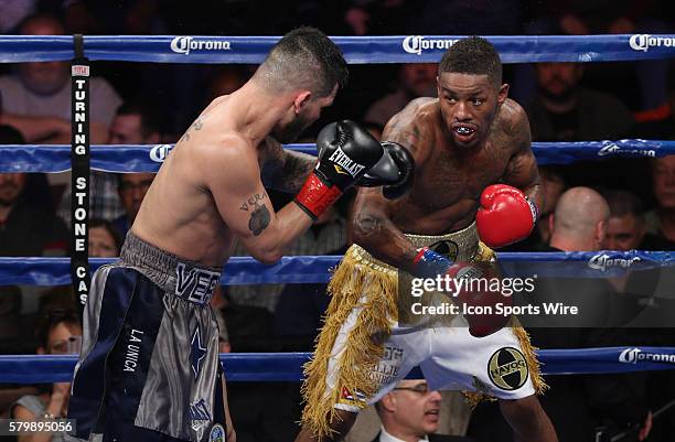 Bryan Vera punches Willie Monroe Jr. During their NABA/NABO middleweight championship fight at the Turning Stone Resort Casinoin Verona, NY.