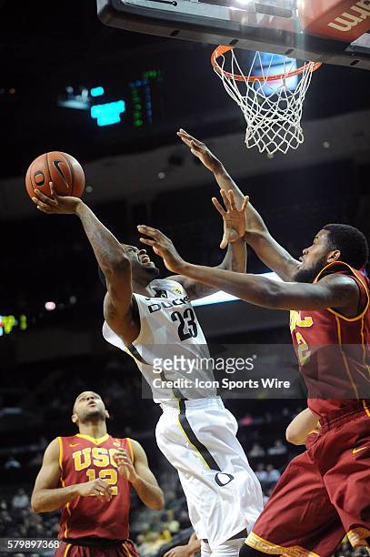 Oregon forward Elgin Cook shoots for the goal during the Oregon Ducks game the USC Trojans in Matthew Knight Arena in Eugene, Oregon.