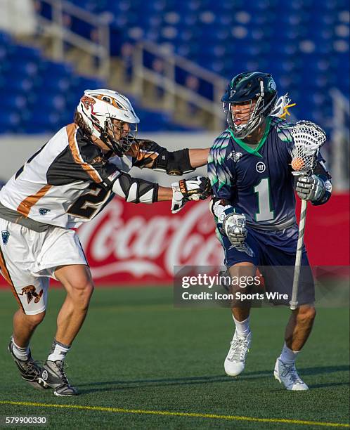 Chesapeake Bayhawks midfield Joe Walters is being defended by a Rochester defender during the MLL game between Rochester Rattlers versus Chesapeake...