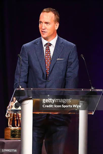 Peyton Manning speaks after receiving the 2015 Bart Starr Award during the 28th Annual NFL-Sanctioned Super Bowl Breakfast. The breakfast was held at...