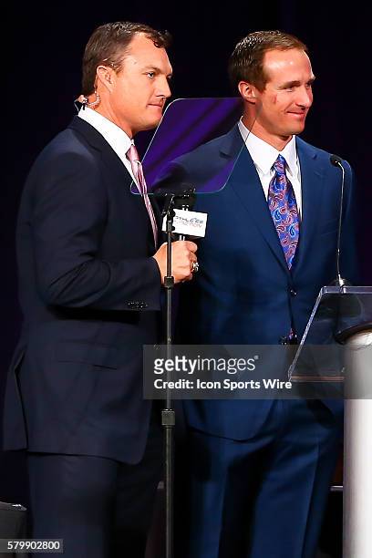 Drew Brees and John Lynch talk during the 2015 Bart Starr Award during the 28th Annual NFL-Sanctioned Super Bowl Breakfast. The breakfast was held at...