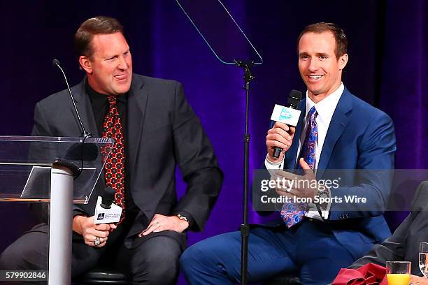 Drew Brees and Brent Jones talk during the 2015 Bart Starr Award during the 28th Annual NFL-Sanctioned Super Bowl Breakfast. The breakfast was held...