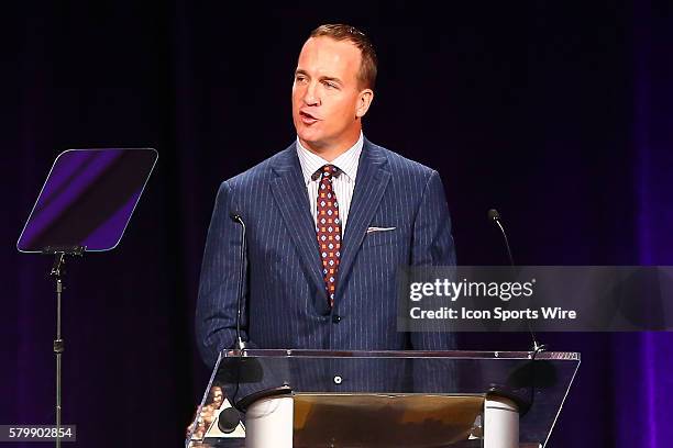 Peyton Manning speaks after receiving the 2015 Bart Starr Award during the 28th Annual NFL-Sanctioned Super Bowl Breakfast. The breakfast was held at...