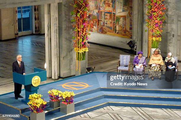 Norway - Liberian President Ellen Sirleaf, Leymah Gbowee of Liberia and Tawakkul Karman of Yemen listen to the speech of Nobel committee chairman...