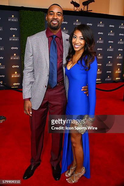Detroit Lions wide receiver Calvin Johnson and girlfriend Brittany McNorton on the Red Carpet for the 4th Annual NFL Honors held at Symphony Hall at...