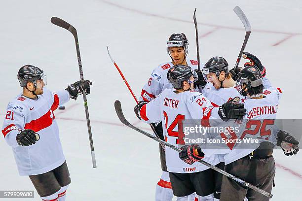 Swiss teammates celebrate goal by Lucas Hischier against Germany during Switzerland's 5-2 victory over Germany at the IIHF World Junior Championship...