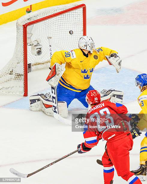 Alexander Sharov of Russia scores goal past Linus Soderstrom of Sweden during Russia's 4-1 victory over Sweden at the IIHF World Junior Championship...