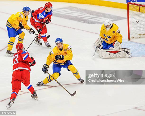Alexander Sharov of Russia scores goal past Linus Soderstrom of Sweden during Russia's 4-1 victory over Sweden at the IIHF World Junior Championship...