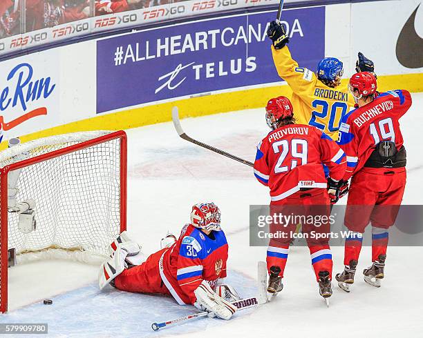 Adam Brodecki of Sweden scores goal during Russia's 4-1 victory over Sweden at the IIHF World Junior Championship at Air Canada Centre in Toronto,...