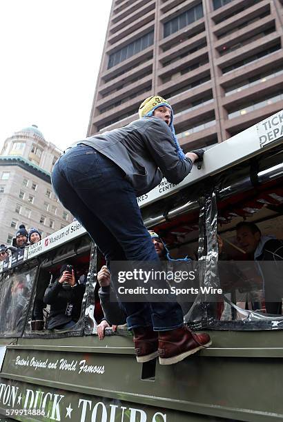 Rob Gronkowski does a pole dance routine hanging off the Duck Boat. The New England Patriots paraded through the streets of Boston to celebrate their...