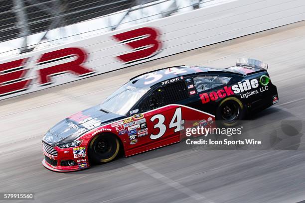 Brett Moffitt, NASCAR Sprint Cup Series driver of the Dockside Logistics Ford during the FedEx 400 Benefiting Autism Speaks at Dover International...