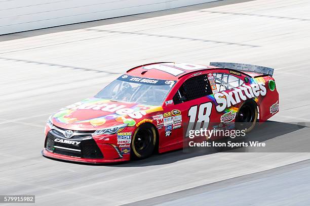 Kyle Busch, NASCAR Sprint Cup Series driver of the Skittles Toyota during the FedEx 400 Benefiting Autism Speaks at Dover International Speedway in...