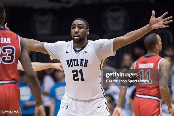 Butler Bulldogs forward Roosevelt Jones defends St. John's Red Storm guard Rysheed Jordan during the NCAA basketball game between the Butler Bulldogs...