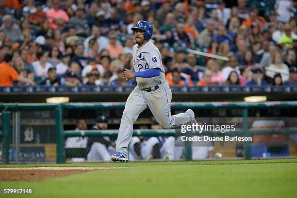 Christian Colon of the Kansas City Royals scores from second base on a single by Jarrod Dyson of the Kansas City Royals during the fifth inning of a...