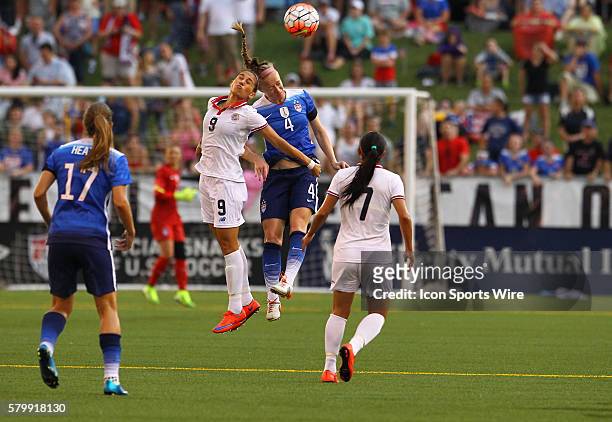 Costa Rica forward Carolina Venegas and United States of America defender Becky Sauerbrunn both fight for the header during the first half of the...