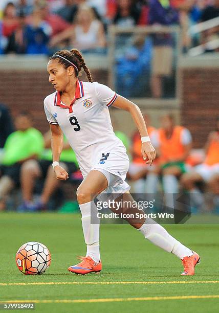 Costa Rica forward Carolina Venegas takes the ball down field during a match between USA and Costa Rica at Finley Stadium in Chattanooga, TN