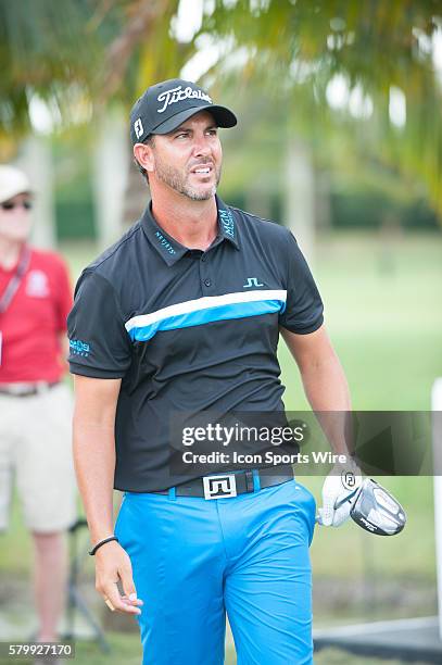 Scott Pierch of the US watches his ball after he tees off at the 2nd hole during the second round of the World Golf Championships-Cadillac...