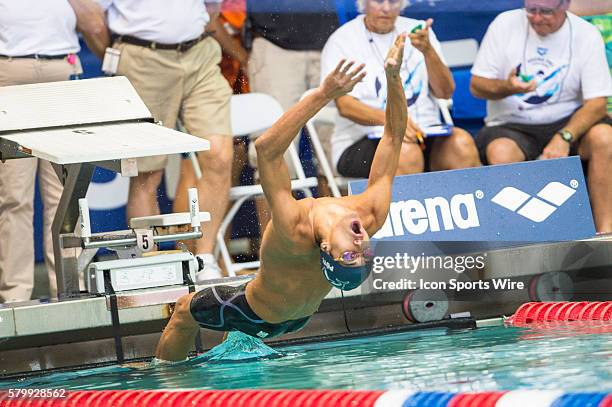 Zachary Poti competes in the 100m backstroke preliminary during the Arena Pro Swim Series at the YMCA Aquatic Center in Orlando, FL.