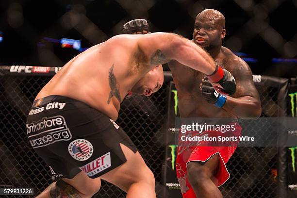 June 06, 2015 - Shawn Jordan battles with Derrick Lewis during their heavyweight bout at UFC Fight Night at Smoothie King Center in New Orleans, LA....