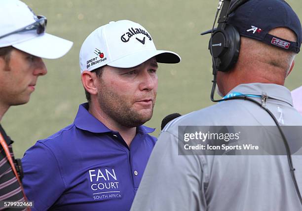 Branden Grace of South Africa answers questions after finishing third with a score of fifteen under par for the PGA Championship at Whistling Straits...