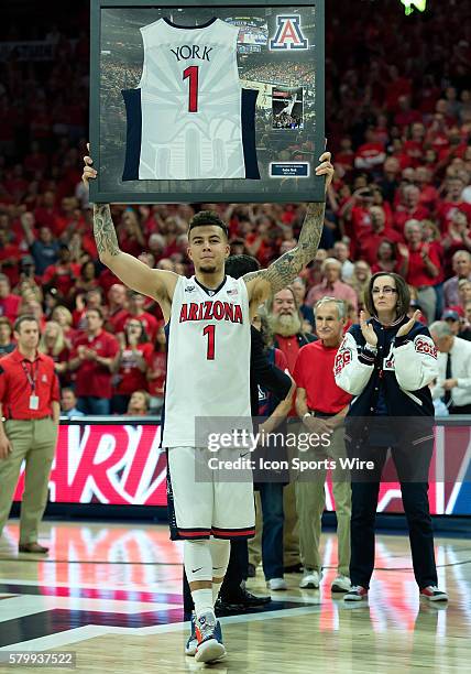 Senior Arizona Wildcats guard Gabe York celebrates in front of 14,644 fans after the Wildcats blast the Stanford Cardinal 94-62 at the McKale...