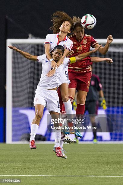 Costa Rica forward Carolina Venegas, teammate midfielder Shirley Cruz and Spain midfielder Alexia Putellas fight for the ball during the 2015 FIFA...
