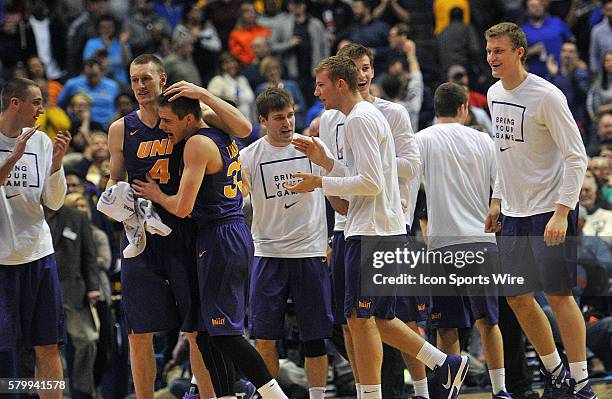 Northern Iowa players react after upsetting Wichita State after a Missouri Valley Conference Championship basketball game between the Wichita State...