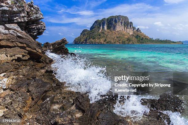 beautiful andaman sea, corals and splash at koh poda - koh poda stock pictures, royalty-free photos & images