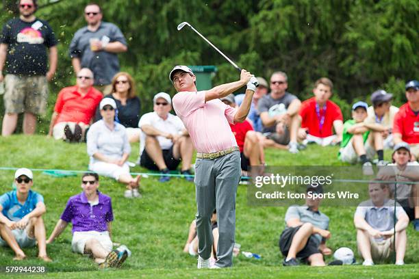 Kevin Kisner watches his tee shot on the eighth hole during the final round of the Memorial Tournament presented by Nationwide Insurance held at...