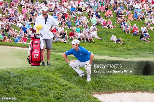 Kevin Streelman lines up his chip shot from the rough on the 18th green during the final round of the Memorial Tournament presented by Nationwide...