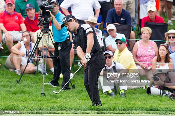 David Lingmerth chips onto the 18th green during the first sudden-death playoff hole during the final round of the Memorial Tournament presented by...
