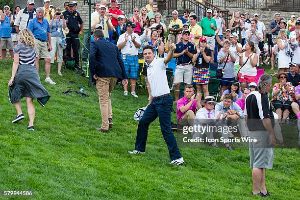 Justin Rose gives tournament winner David Lingmeth a thumbs up as he walks off of the course after a three-hole sudden-death playoff at the...