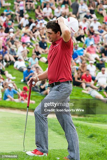 Keegan Bradley lines up his chip shot from the rough on the 18th green during the final round of the Memorial Tournament presented by Nationwide...