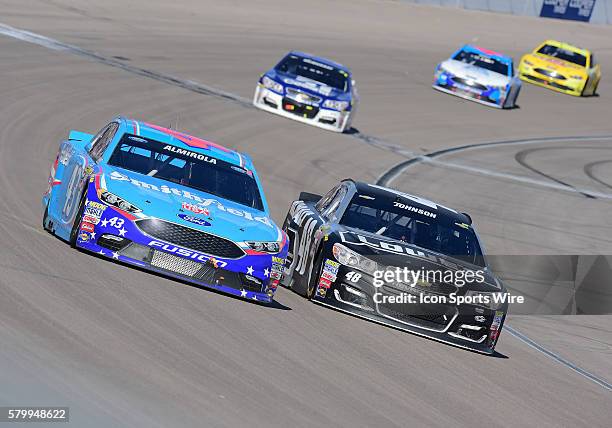 Aric Almirola Richard Petty Motorsports Ford Fusion and Jimmie Johnson Hendrick Motorsports Chevrolet Impala SS during the Kobalt 400 NASCAR Sprint...