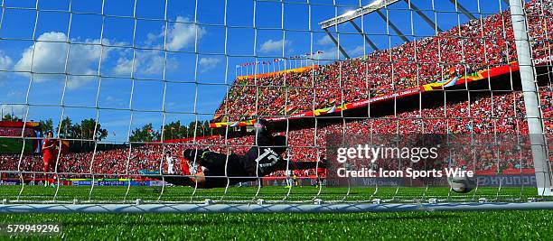 Canadian Christine Sinclair takes a penalty kick on goalkeeper Wang Fei and scores for the only goal of the game during the FIFA Womens World Cup, at...