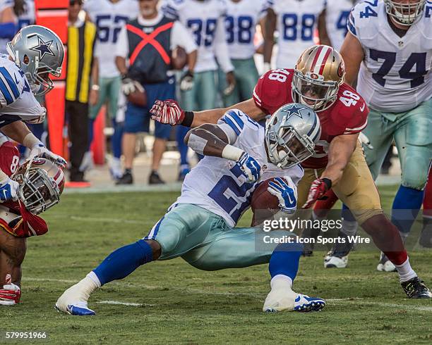 San Francisco 49ers tight end Rory Anderson tackles Dallas Cowboys running back Joseph Randle on Sunday, August 23, 2015 at Levi's Stadium in Santa...