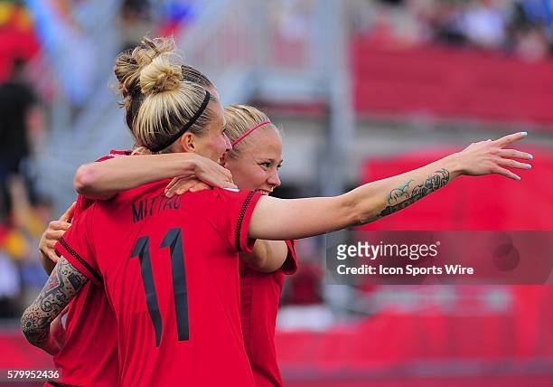 June 11, 2015 - Ottawa, Ontario, Canada Forward Anja Mittag of Germany is congratulated after her goal during the FIFA 2015 Women's World Cup Group B...