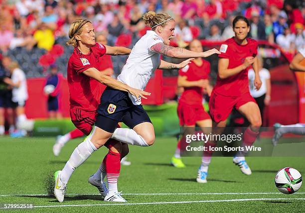 June 11, 2015 - Ottawa, Ontario, Canada Forward Isabell Herlovsen of Norway is fouled by Defender Saskia Bertusiak of Germany during the FIFA 2015...