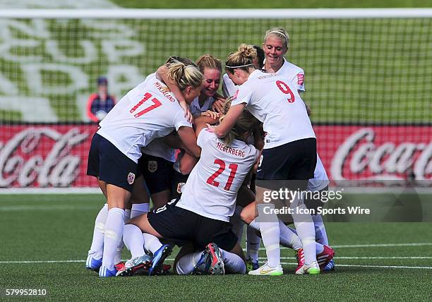 June 11, 2015 - Ottawa, Ontario, Canada Norway team mates surround Maren Mjelde of Norway after her goal during the FIFA 2015 Women's World Cup Group...