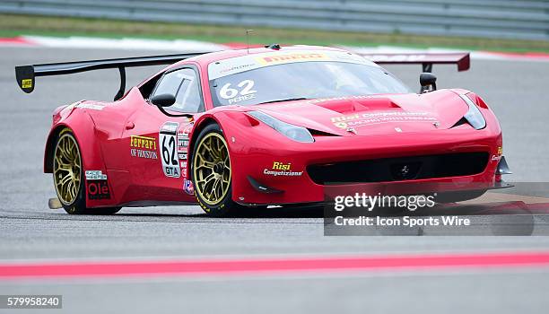 Ricardo Perez, driving a Ferrari 458 GT3 Italia for Risi Competizione lifts the left front wheel in turn one during the Pirelli World Challenge Grand...