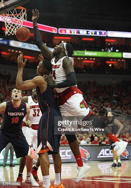 Louisville Cardinals forward Montrezl Harrell crashes the boards in a game between the University of Virginia Cavaliers and the University of...