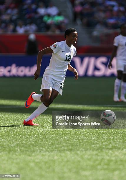June 2015 Nigeria's Halimatu Ayinde moves the ball during the Australia vs Nigeria game at the Investors Group Field in Winnipeg MB.