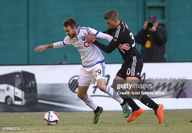 Conor Doyle of D.C United defends against Eric Alexander of Montreal Impact during a MLS soccer match at RFK Stadium, in Washington DC. D.C United...