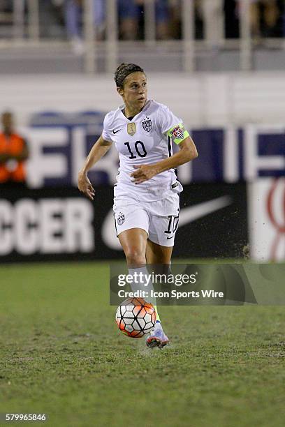 United States midfielder Carli Lloyd dribbles the ball to towards the goal against Germany during the first half at FAU Stadium in Boca Raton,...