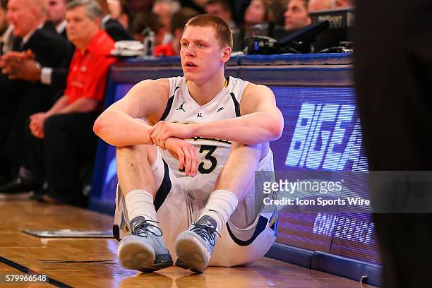 Marquette Golden Eagles forward Henry Ellenson waits to go back in the game during the first half of the Big East Tournament game between the...