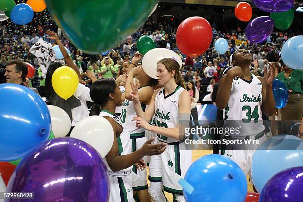Notre Dame Fighting Irish guard Madison Cable and teammate Notre Dame forward Markisha Wright celebrate the ACC Women's Basketball Tournament...